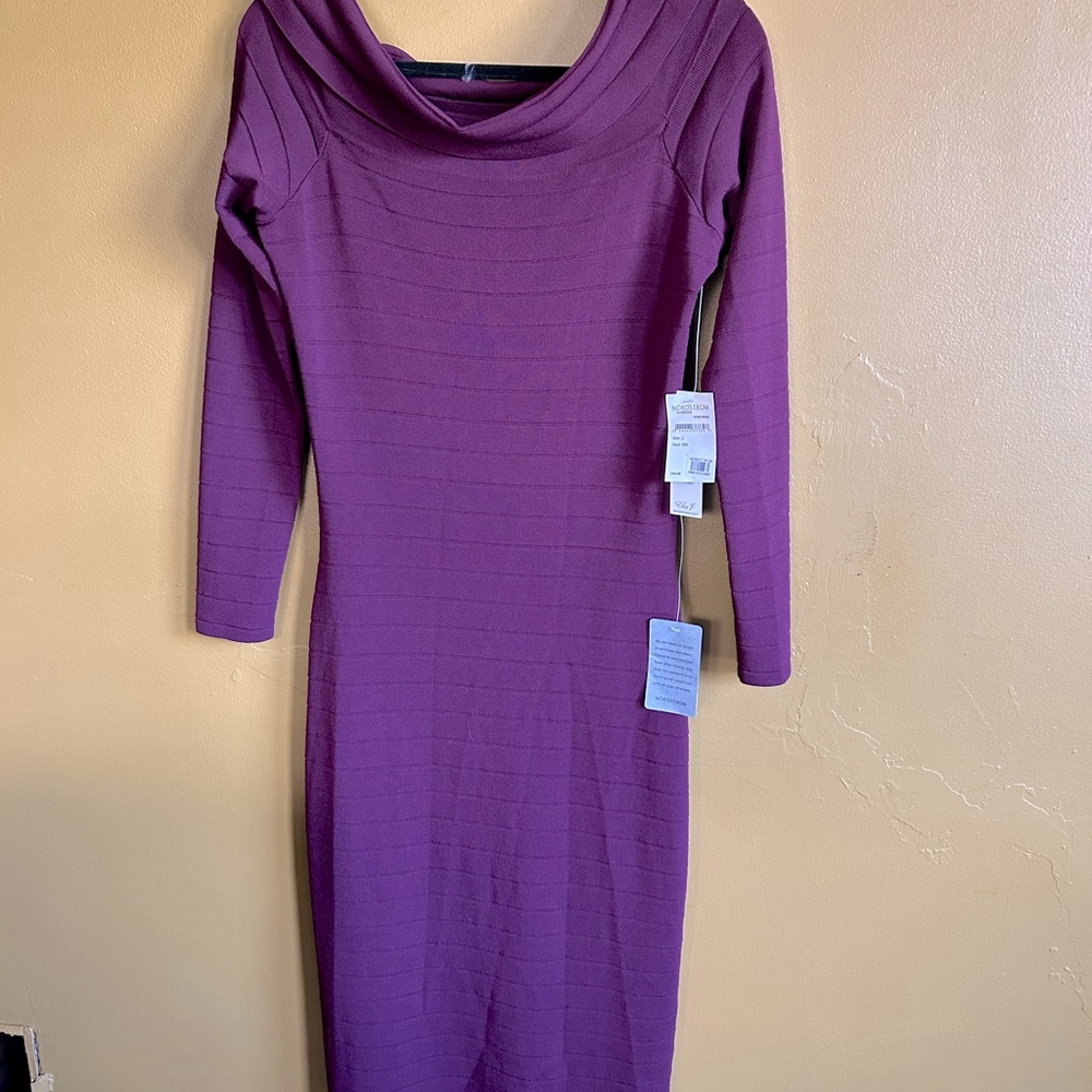 Woman’s  pullover stretch ribbed dress with open neckline and fold over collar